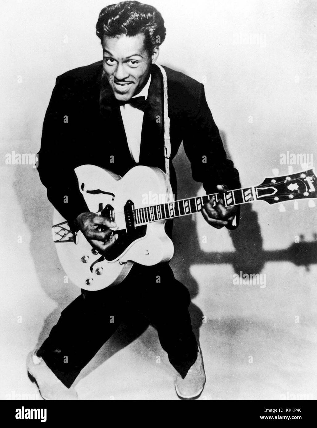 Chuck Berry, a pioneering rock and roll musician, captured in a 1957 photograph, showcasing his influence on the music industry. Stock Photo