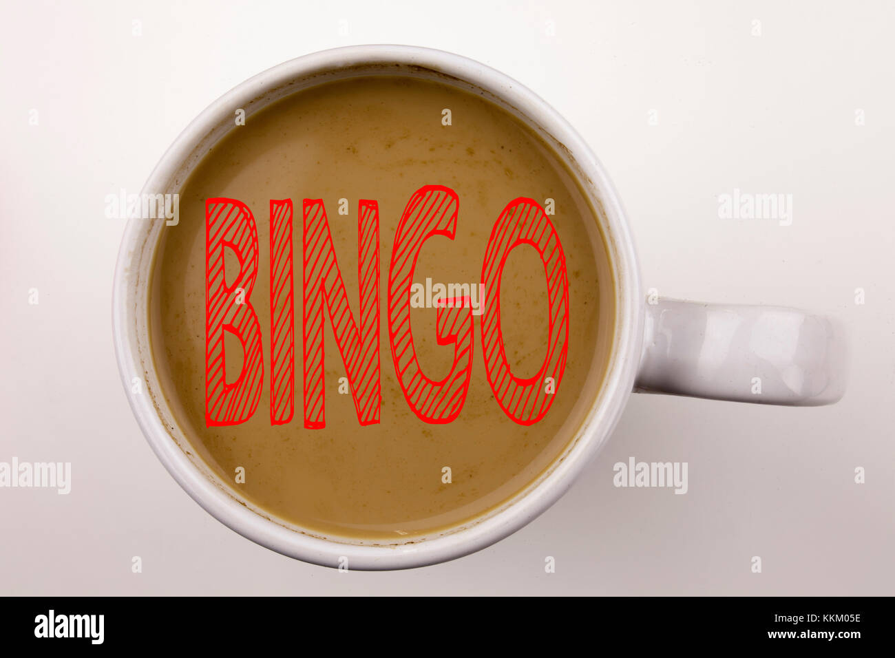Word, writing Bingo text in coffee in cup. Business concept for Lettering Gambling to Win Price Success on white background with space. Black text wit Stock Photo