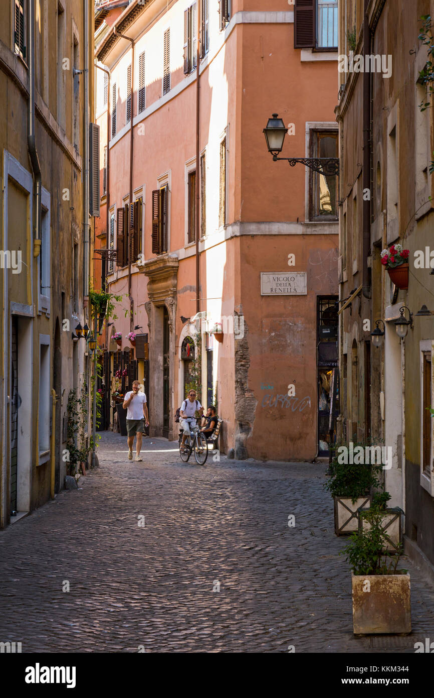 Looking down the cobbled backstreets in the Trastevere area of Rome, Italy towards Vicola della Renella. Stock Photo