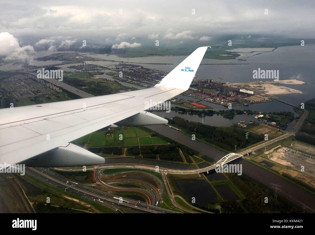 A plane of dutch airline KLM cityhopper over the Diemerpark district