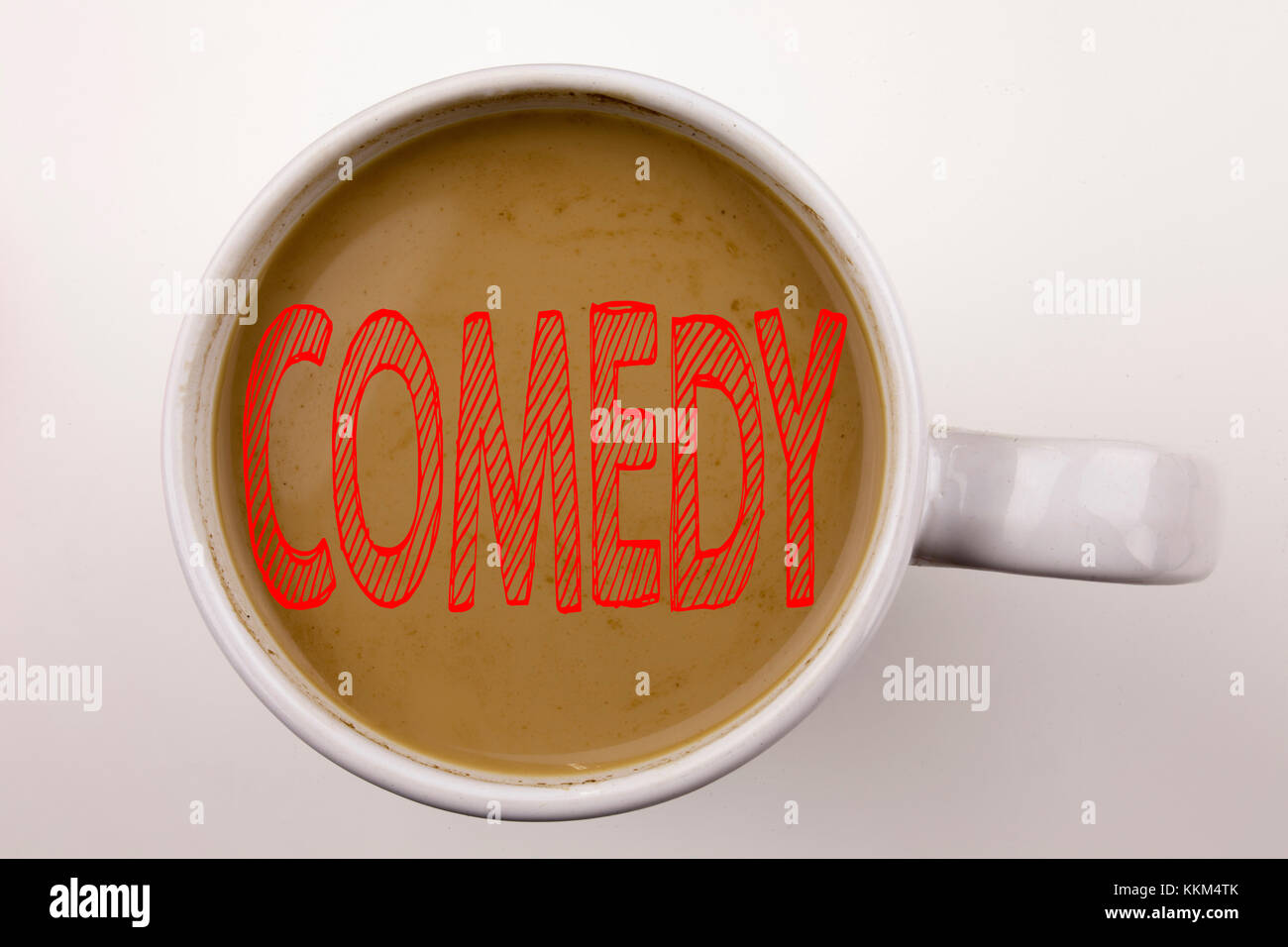 Word, writing Comedy text in coffee in cup. Business concept for Stand Up Comedy Microphone on white background with copy. Black text with red word. Stock Photo