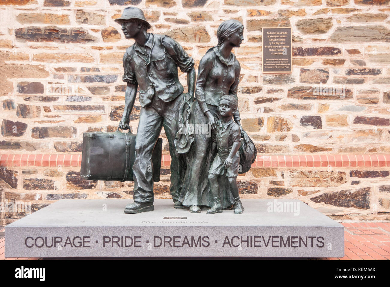 Adelaide SA, Australia November 20, 2009 Black bronze statue of migrants show husband and