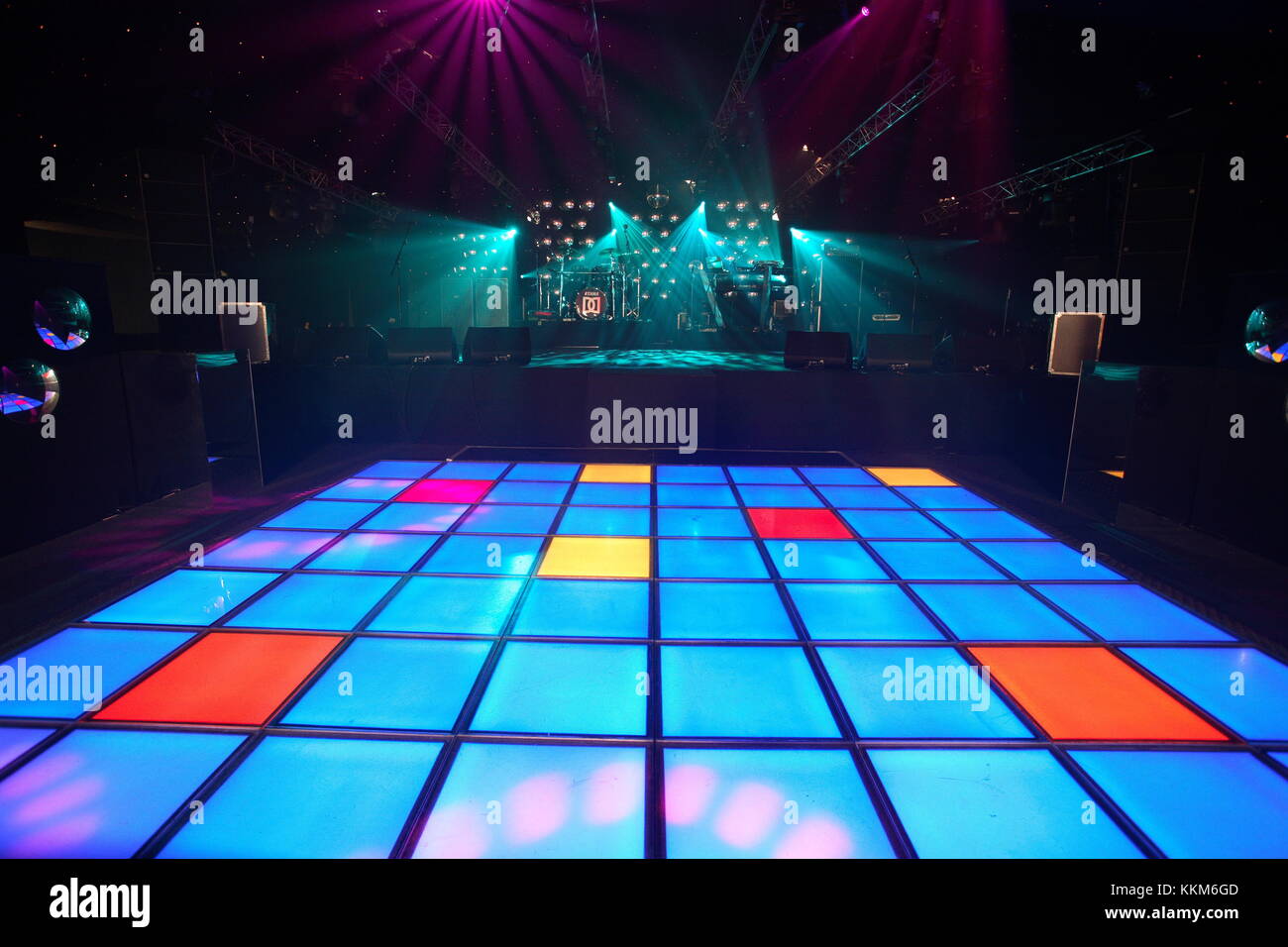 An empty dance floor with illuminated disco squares.  ready for a dance party and celebration.  Seventies kitsch style. Event Stock Photo
