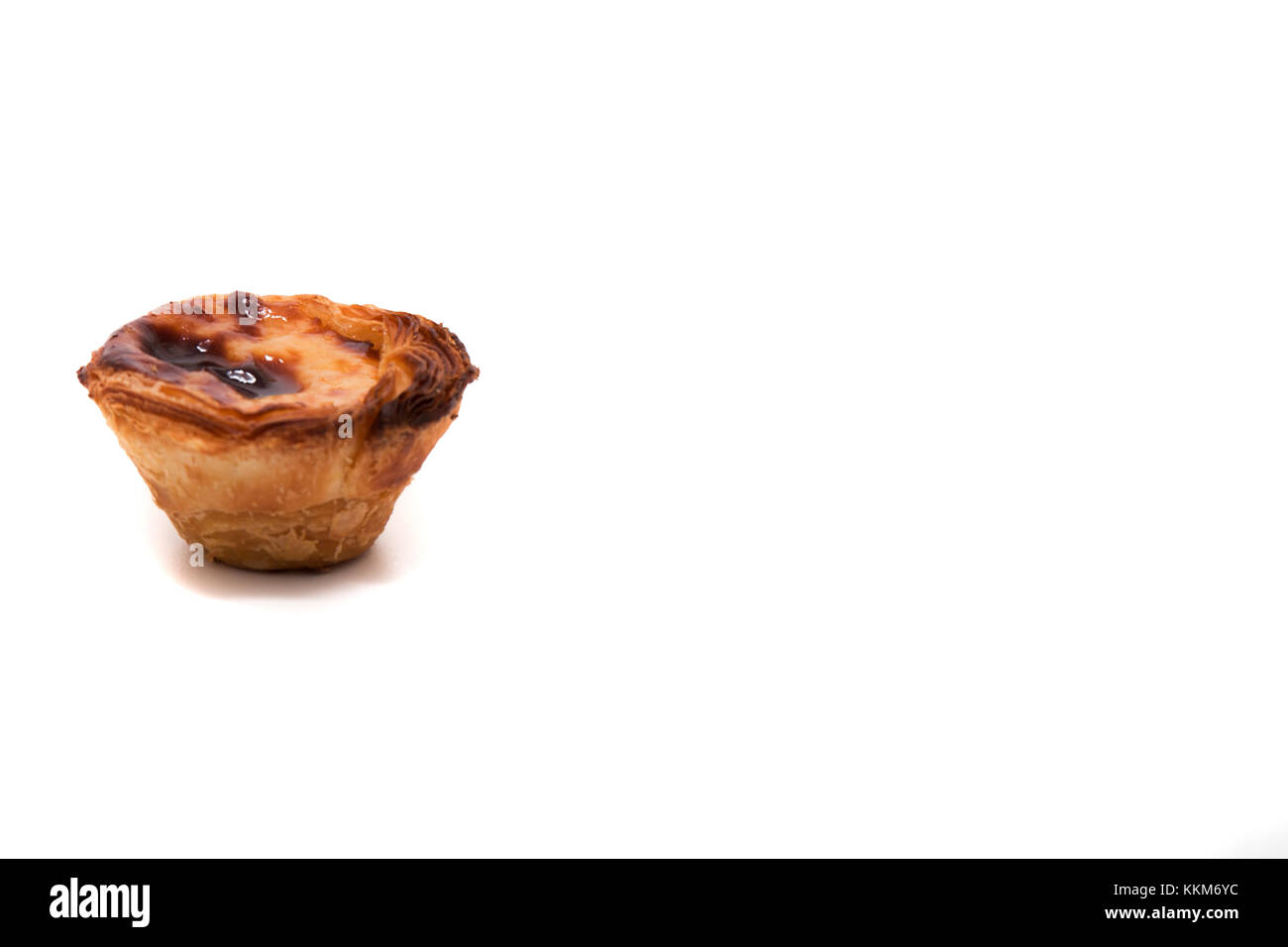 Famous Portuguese egg pastry tart called 'Pastel de Belem' isolated on