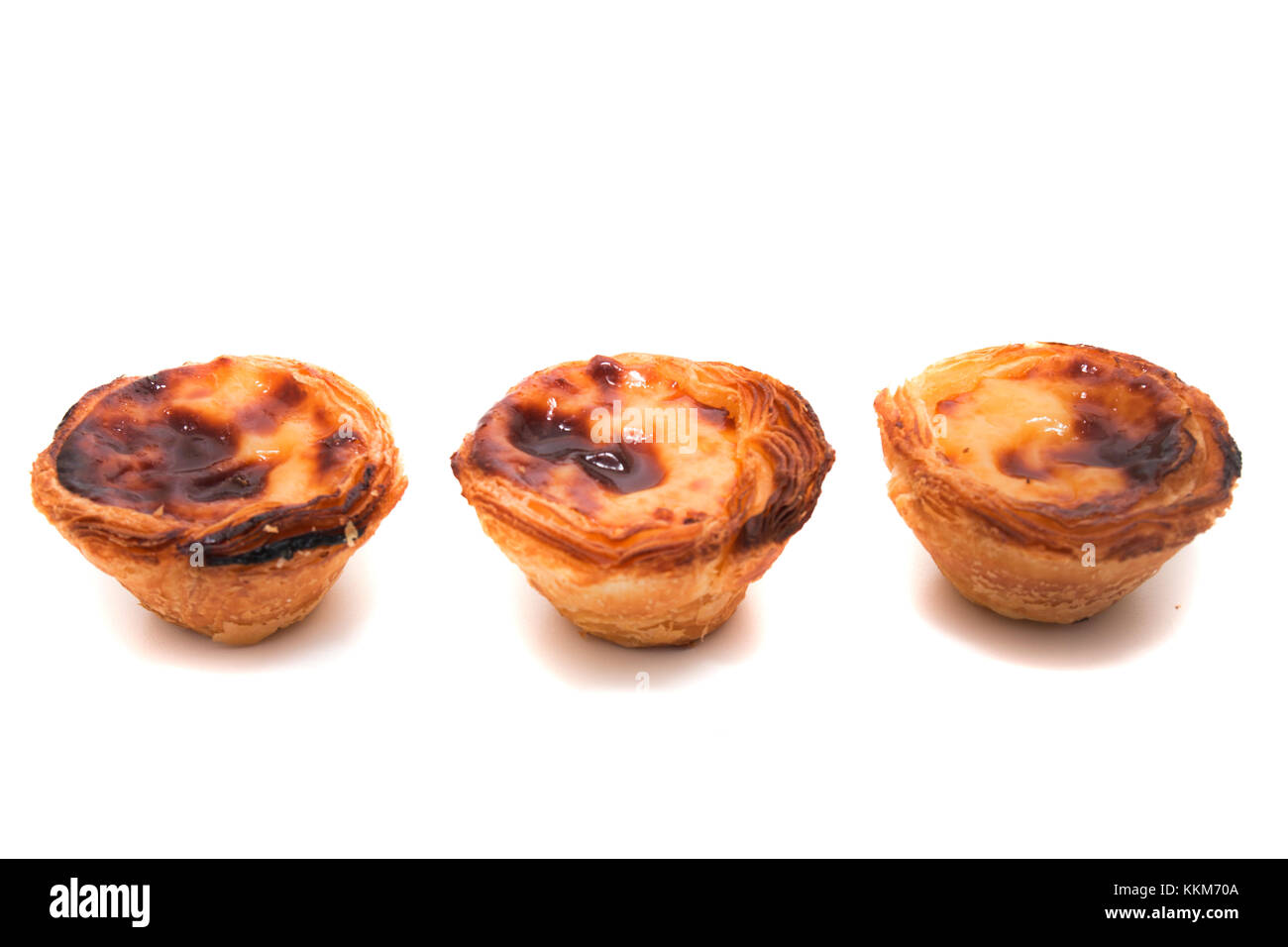 Famous Portuguese egg pastry tart called 'Pastel de Belem' isolated on
