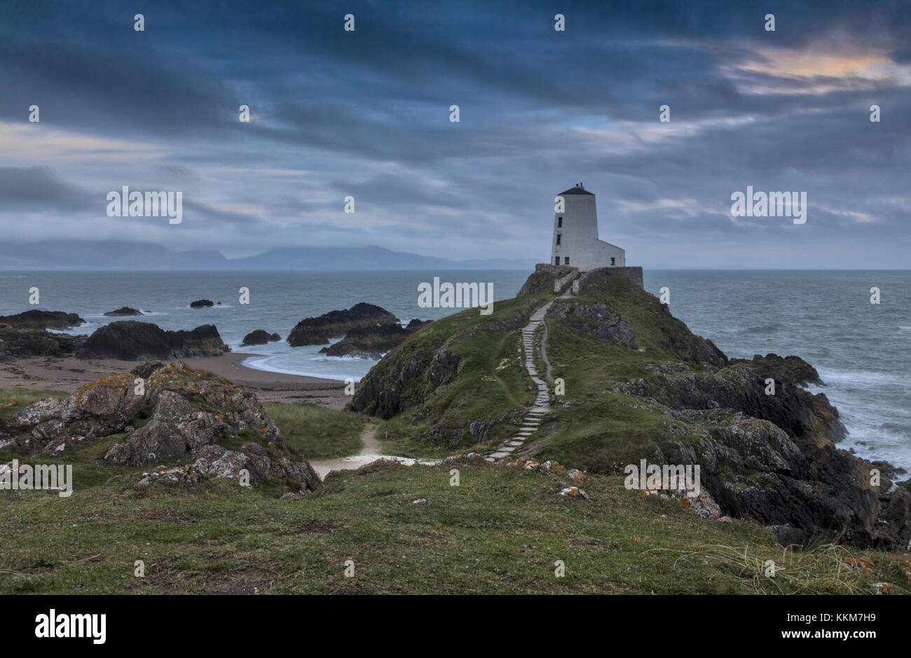 Twr Mawr, lighthouse on the tip of Ynys Llanddwyn island, evening light, Anglesey, Stock Photo