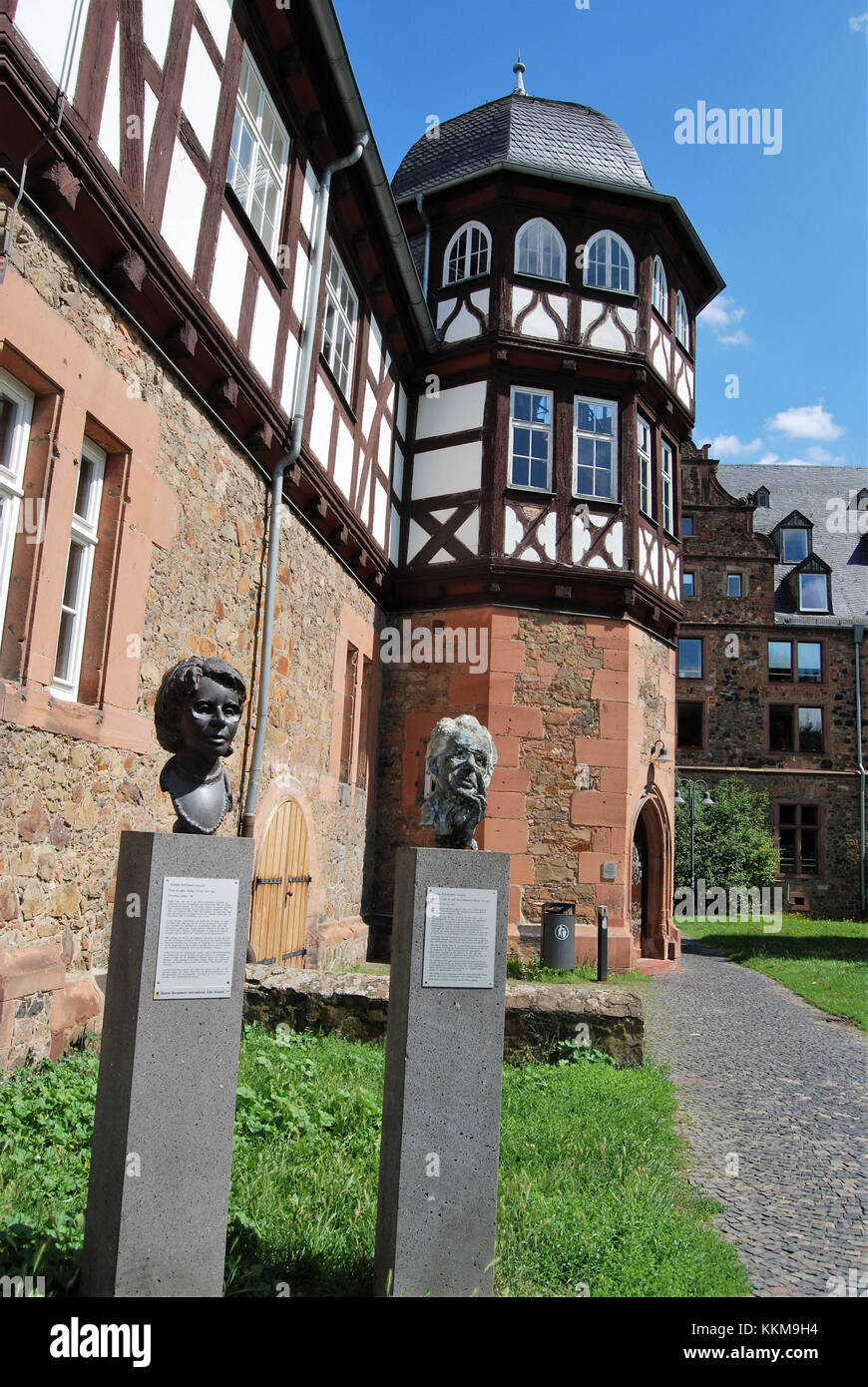 Busts in front of the new castle in Giessen showing the former professors Horst-Eberhardt Richter (on the right) and Helge-Agnes Pross (left) of the Gießen Justus Liebig university Stock Photo