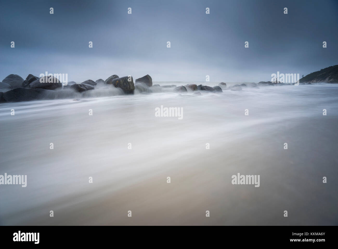 The Baltic Sea, stormy moving sea, shore, beach, stones in the water Stock Photo