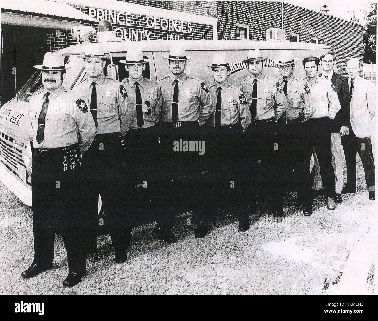 Prince County Sheriff's Office deputies in front of old
