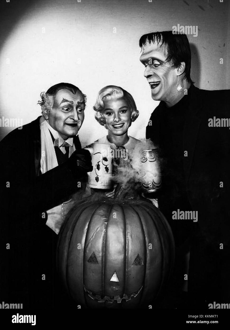 Al Lewis Beverley Owen Fred Gwynne Munsters Halloween publicity photo 1964 Stock Photo