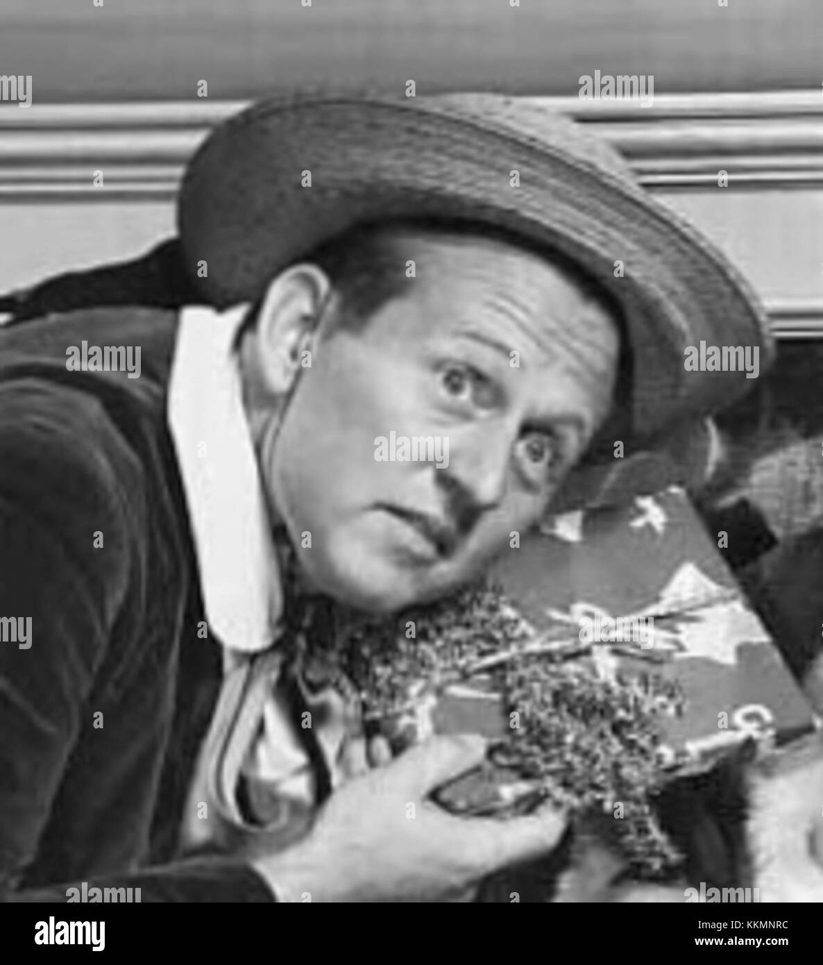 Art Linkletter was a well-known American television personality and host, most famous for his show *Art Linkletter's House Party* which aired in the 1950s. This image from 1957 captures Linkletter at the height of his popularity, engaging with audiences and showcasing his talent for comedy and entertainment. Stock Photo