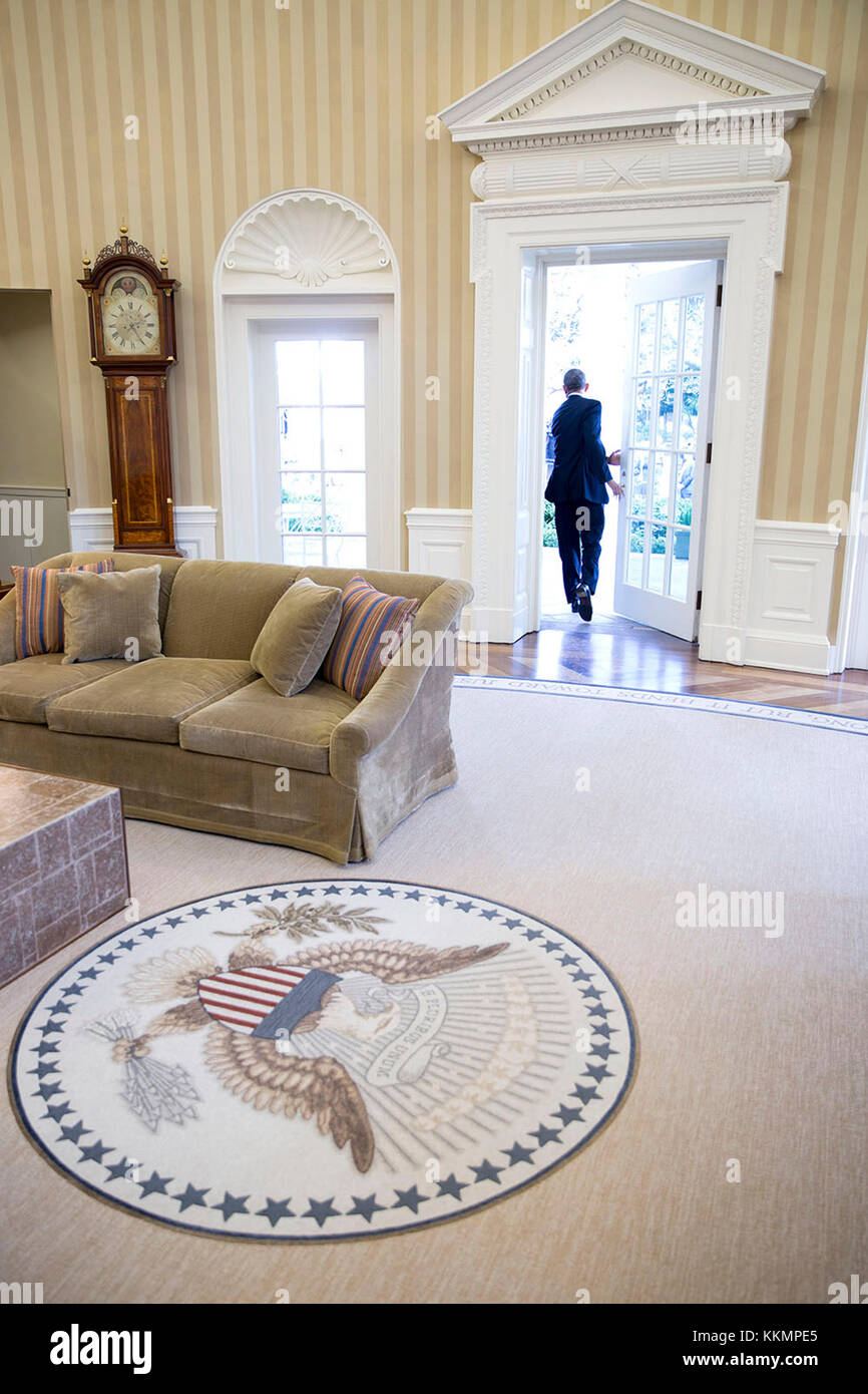 President Barack Obama leaves the Oval Office to deliver a statement in the Rose Garden on the Joint Comprehensive Plan of Action regarding Iran's nuclear program, April 2, 2015. (Official White House Photo by Pete Souza)  This official White House photograph is being made available only for publication by news organizations and/or for personal use printing by the subject(s) of the photograph. The photograph may not be manipulated in any way and may not be used in commercial or political materials, advertisements, emails, products, promotions that in any way suggests approval or endorsement of Stock Photo