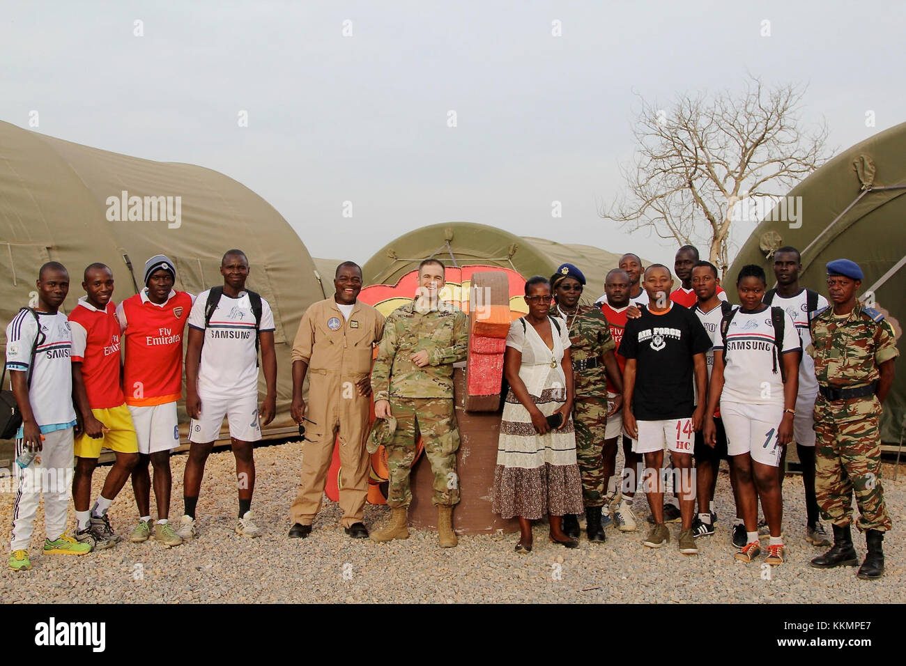 Maj. Andrzej V. Kujawski, Task Force Darby commander at Contingency Location Garoua poses with  Cameroonian Col. Barthelemy Tsilla (in fight suit), commander of Cameroon Air Base 301, and a few of his Airmen on CL Garoua Thanksgiving November 23. Members of the Cameroon Air Force and U.S. servicemembers shared Thanksgiving together. Members of the Cameroon Air Force and U.S. servicemembers shared Thanksgiving together. (Photo by Staff Sgt. Christina J. Turnipseed Contingency Location Garoua Public Affairs Stock Photo