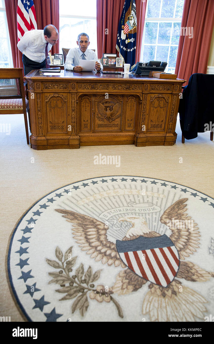 President Barack Obama, with Ben Rhodes, Deputy National Security Advisor for Strategic Communications,  goes over his statement on the Joint Comprehensive Plan of Action regarding Iran's nuclear program, in the Oval Office, April, 2, 2015. (Official White House Photo by Pete Souza)  This official White House photograph is being made available only for publication by news organizations and/or for personal use printing by the subject(s) of the photograph. The photograph may not be manipulated in any way and may not be used in commercial or political materials, advertisements, emails, products,  Stock Photo