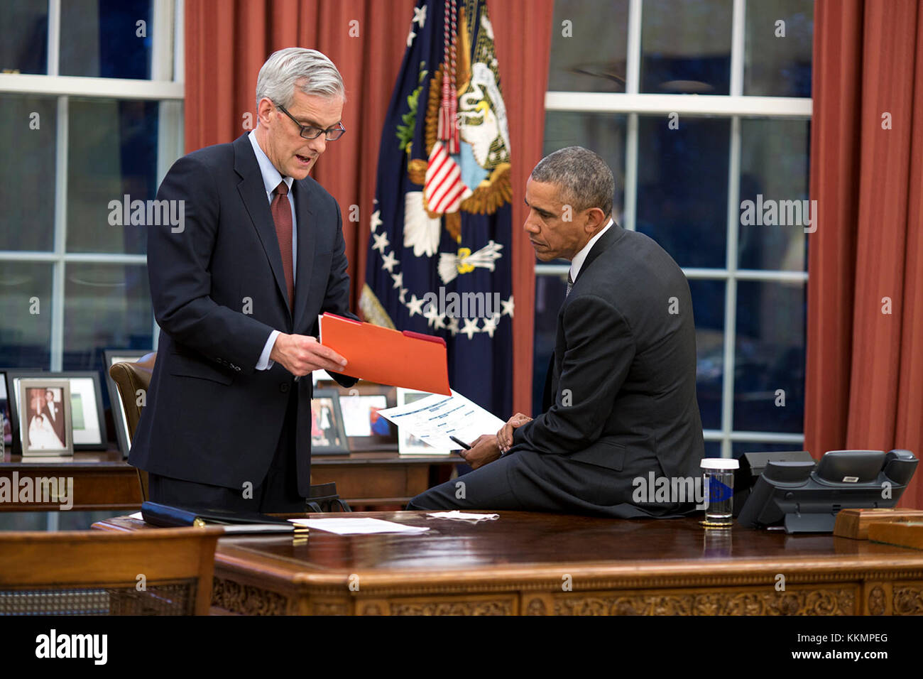 President Barack Obama confers with Chief of Staff Denis McDonough in ...