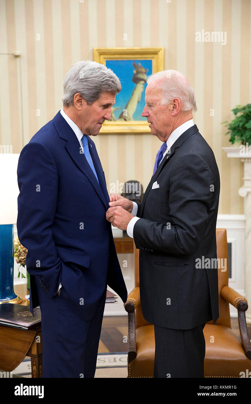 Vice President Joe Biden talks with Secretary of State John Kerry in