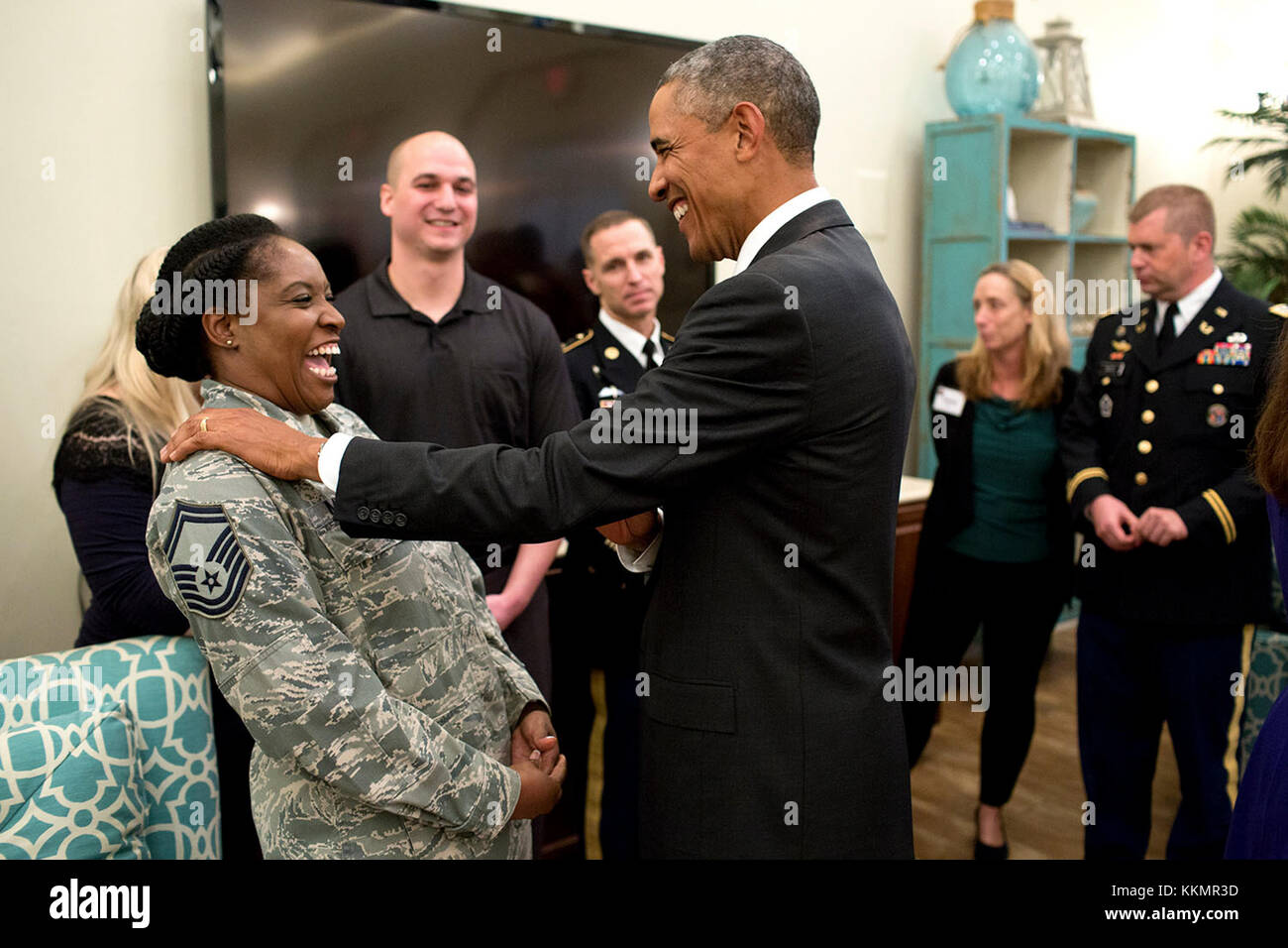 President Barack Obama speaks with military personnel and their families during a military spouse appreciation reception at the Harbor Bay Community Center in Tampa, Fla., Sept. 16, 2014. Stock Photo