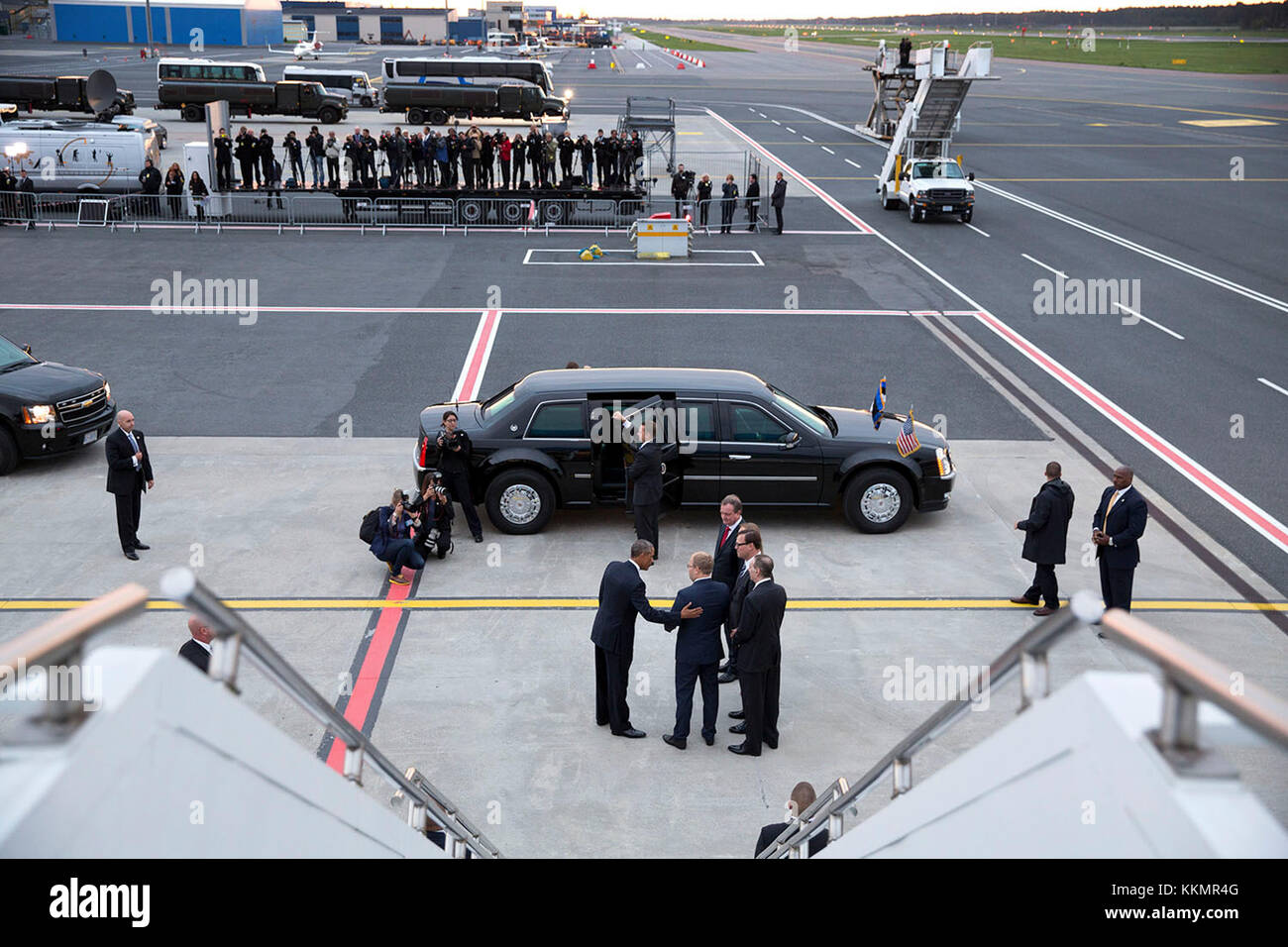 President Barack Obama speaks with Urmas Paet, Minister of Foreign Affairs of Estonia, upon arrival at Tallinn Airport in Tallinn, Estonia, Sept. 3, 2014. Stock Photo