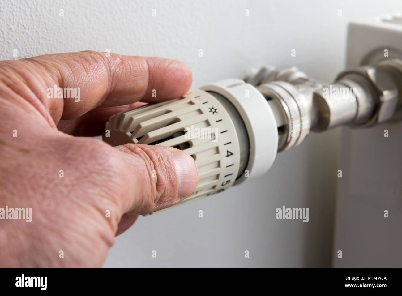 Adjusting thermostat hi-res stock photography and images - Alamy