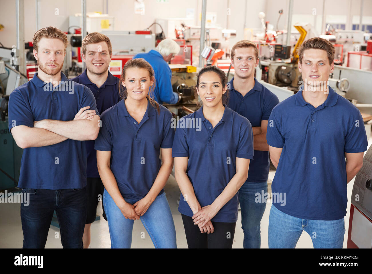 Apprentice engineers in their workplace, group portrait Stock Photo
