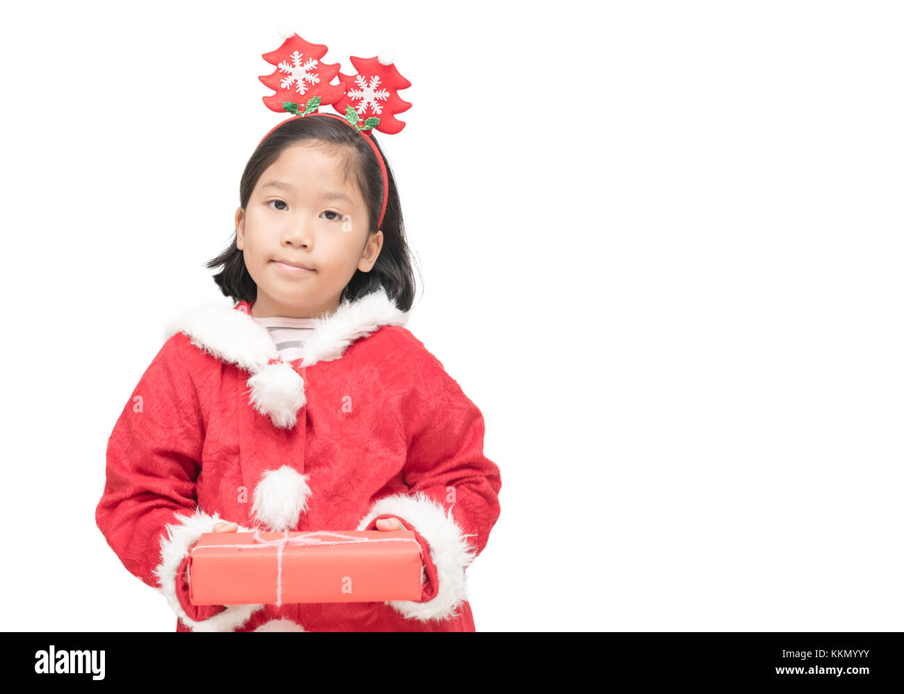 Cute asian girl in santa claus suit holding gift box and smile isolated ...