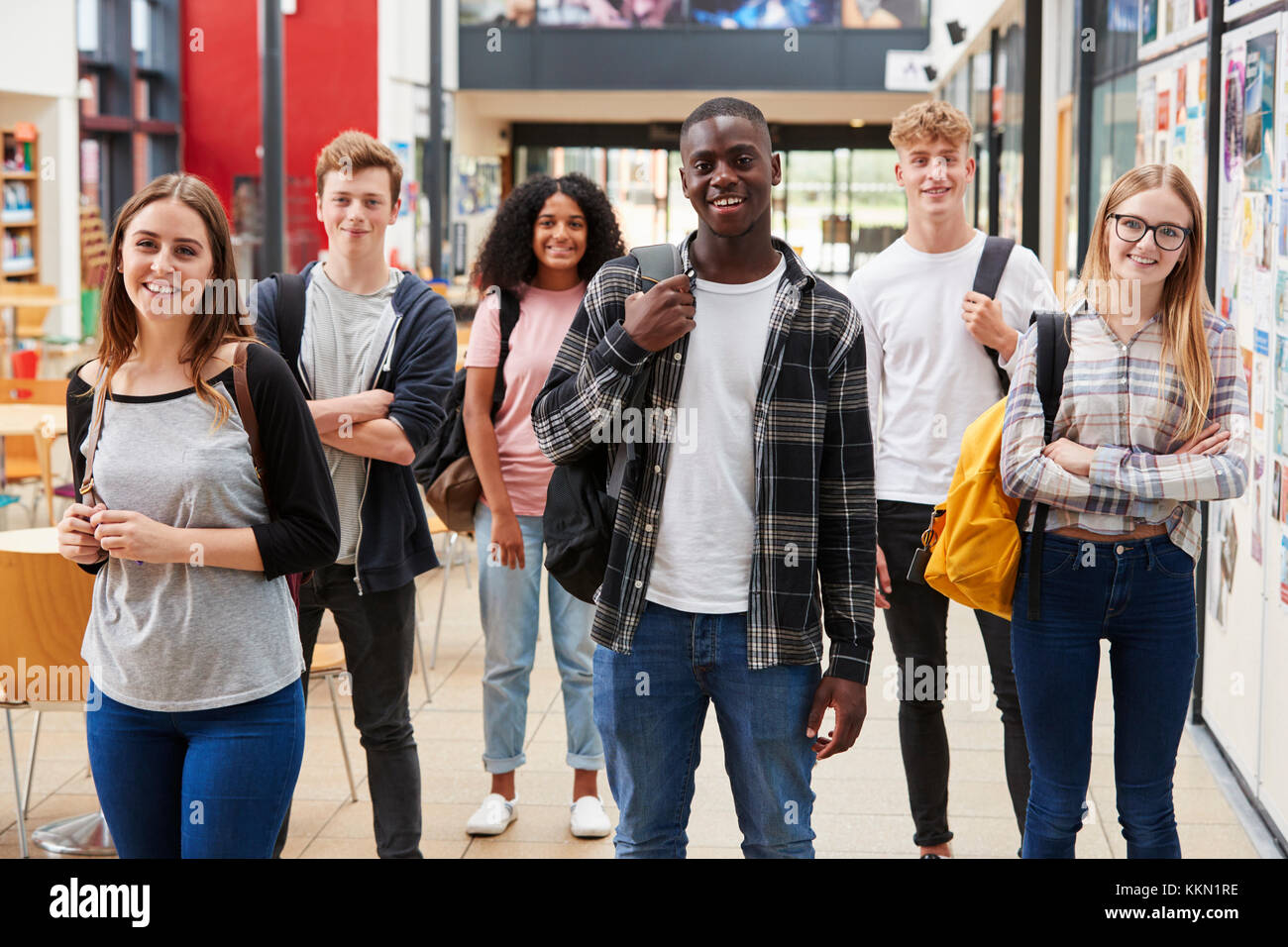 Portrait Of Student Group In Communal Area Of Busy College Stock Photo