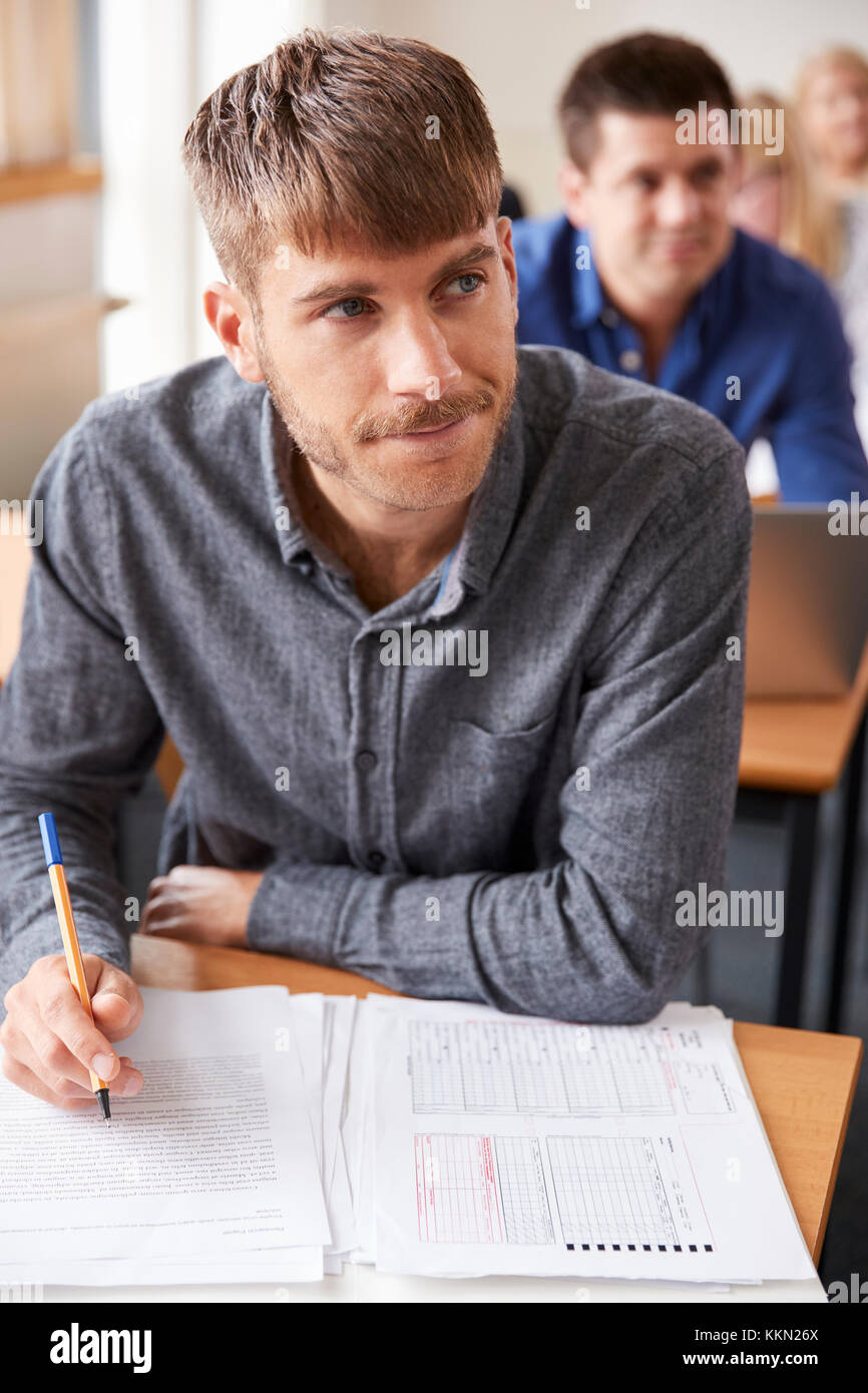 Mature Male Student Attending Adult Education Class Stock Photo