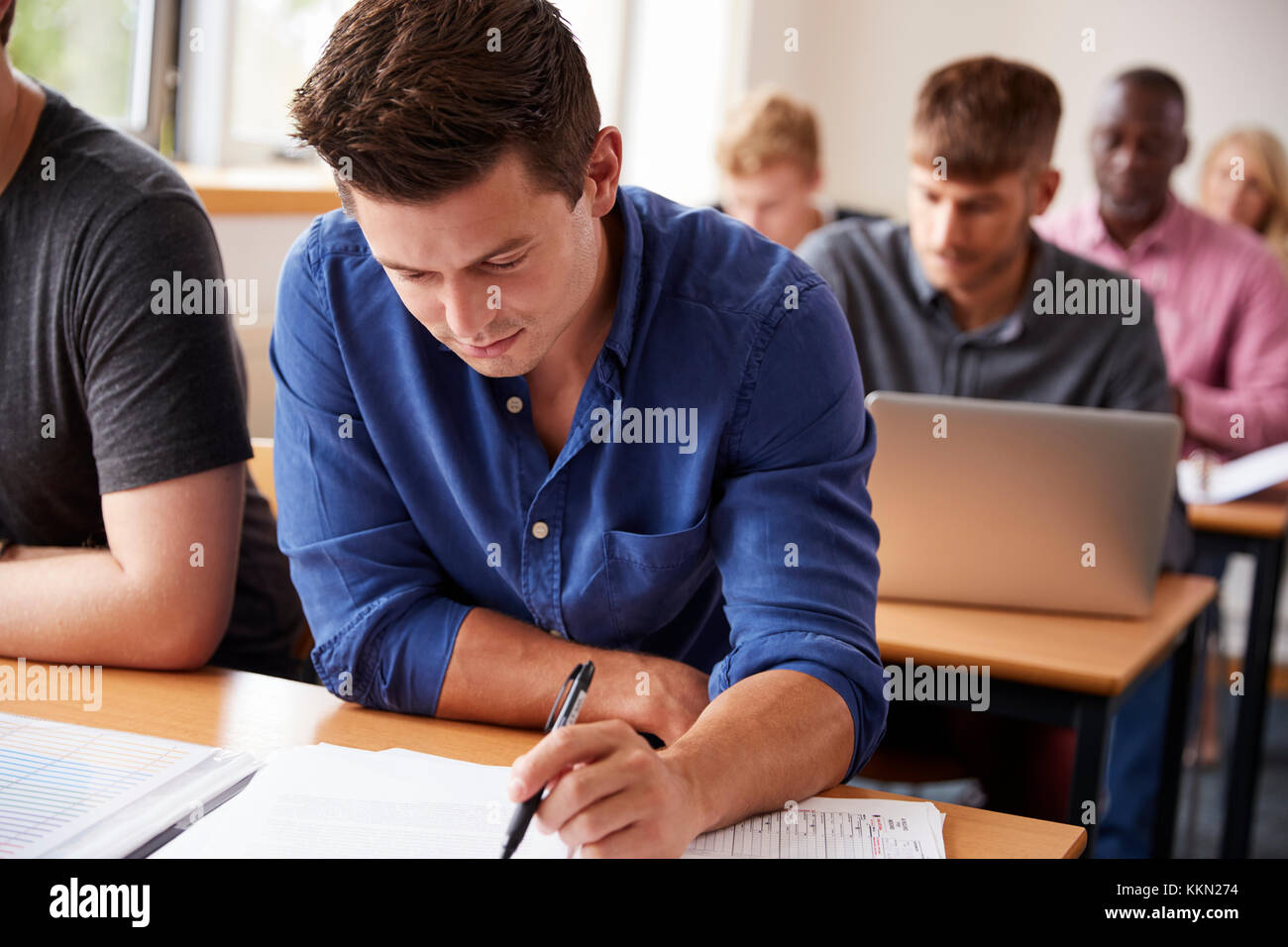 Mature Male Student Attending Adult Education Class Stock Photo