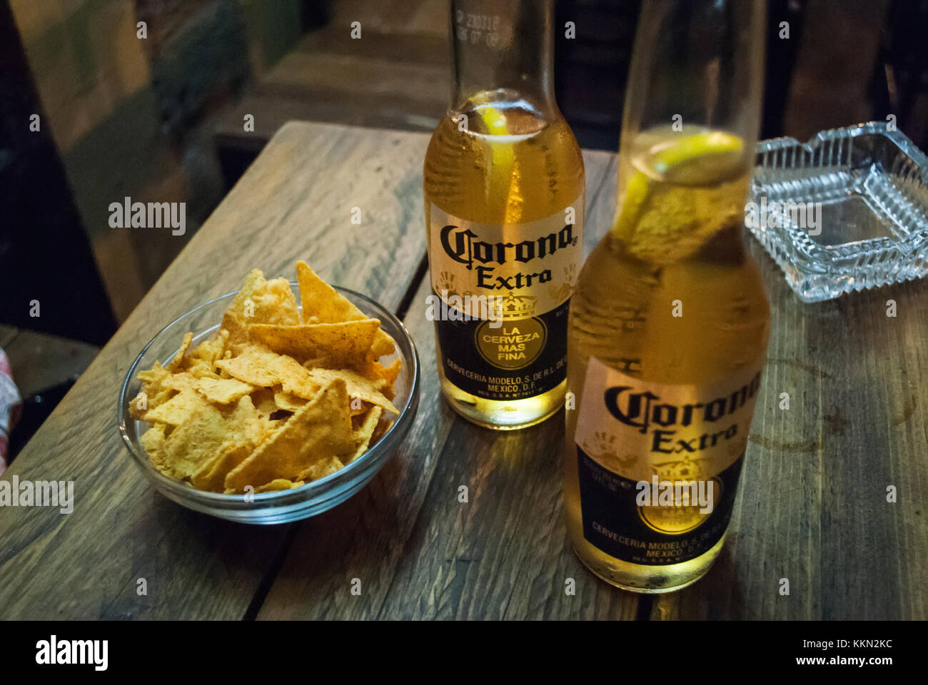 Rhodes, Greece - August 26, 2017: Corona beer with chips on the table ...