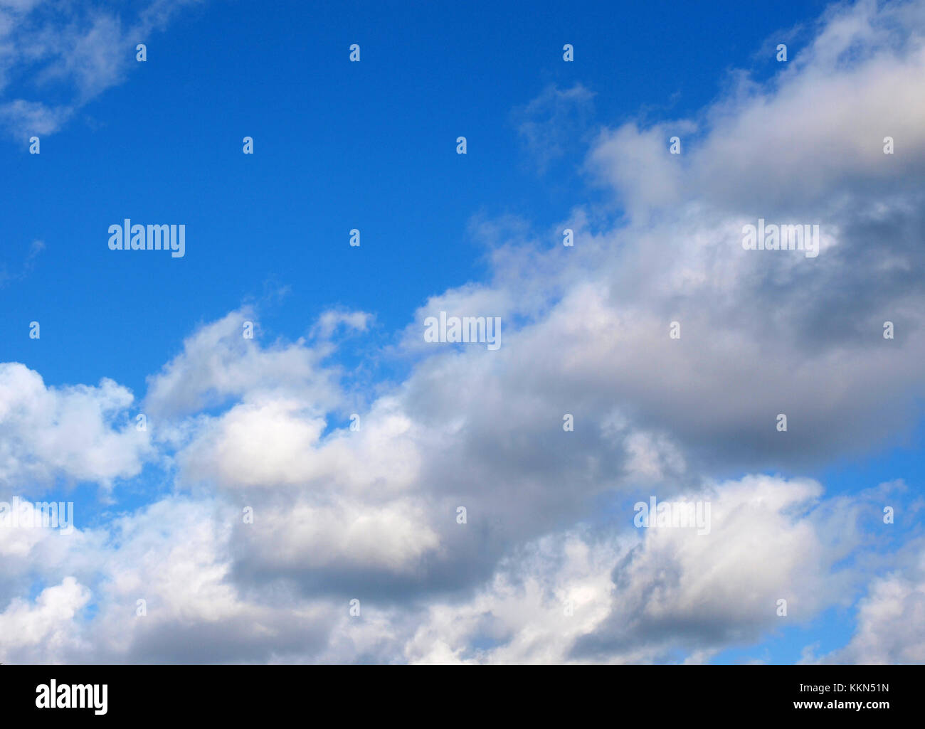 Blue sky with white cumulus clouds for background Stock Photo - Alamy