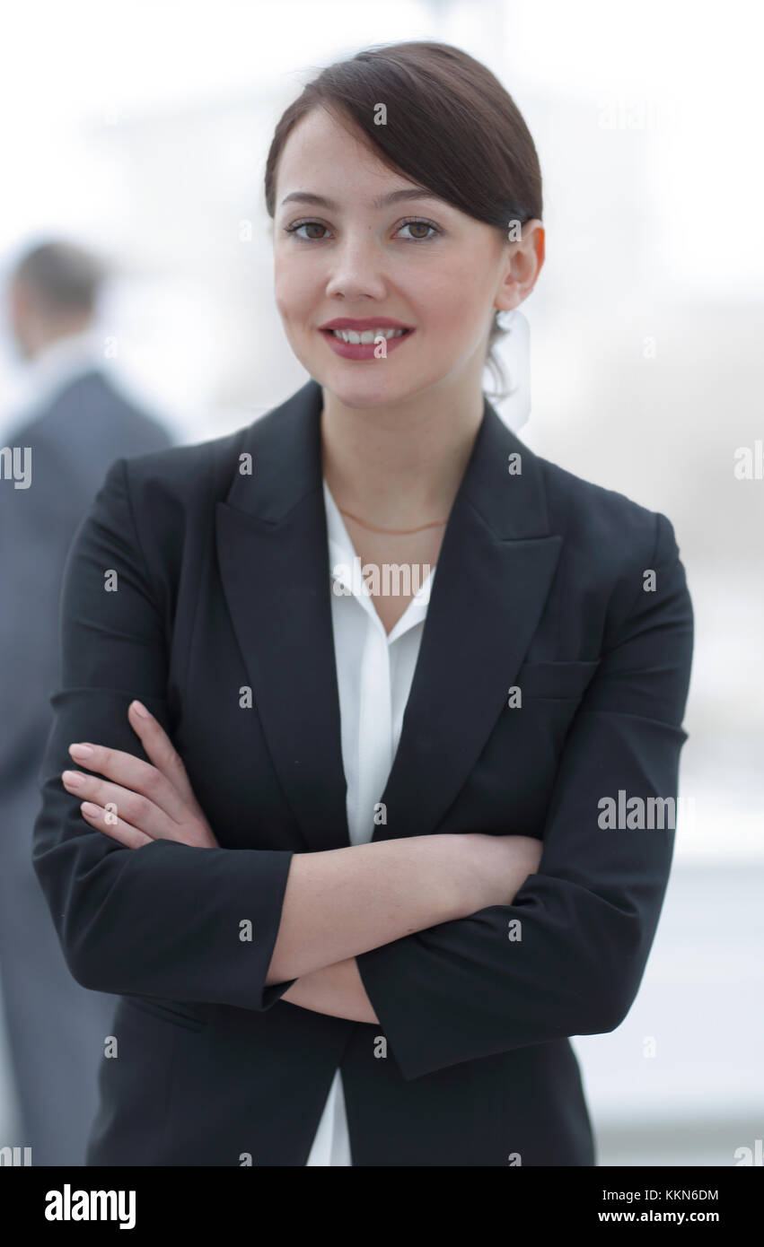 successful young business woman on the background of the office Stock ...