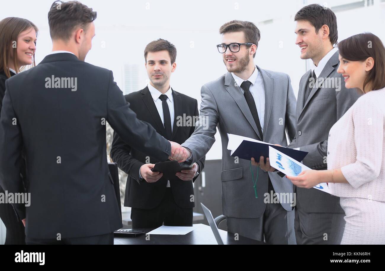 handshake of business partners before the financial transaction Stock ...