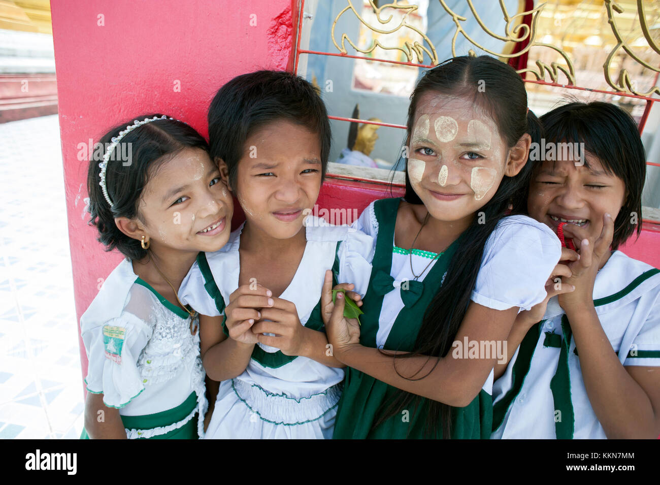 Burmese girls pose for a photograph in Myawaddy, Myanmar (Burma). Stock Photo
