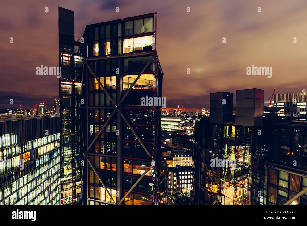 Aerial view of luxury modern apartment buildings on London cityscape skyline at night Stock Photo