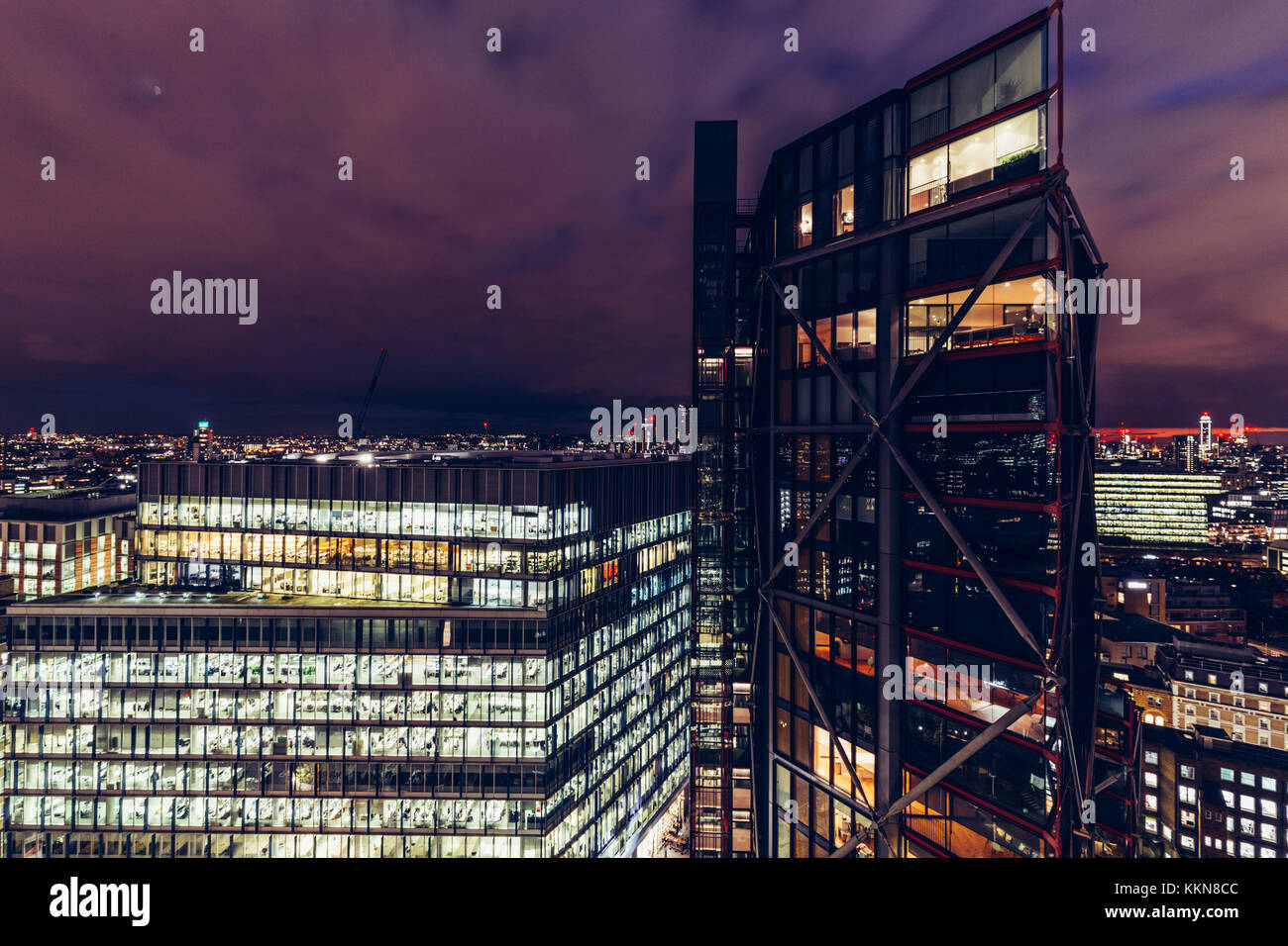 Elevated aerial view of luxury modern apartment buildings on London cityscape skyline at night Stock Photo