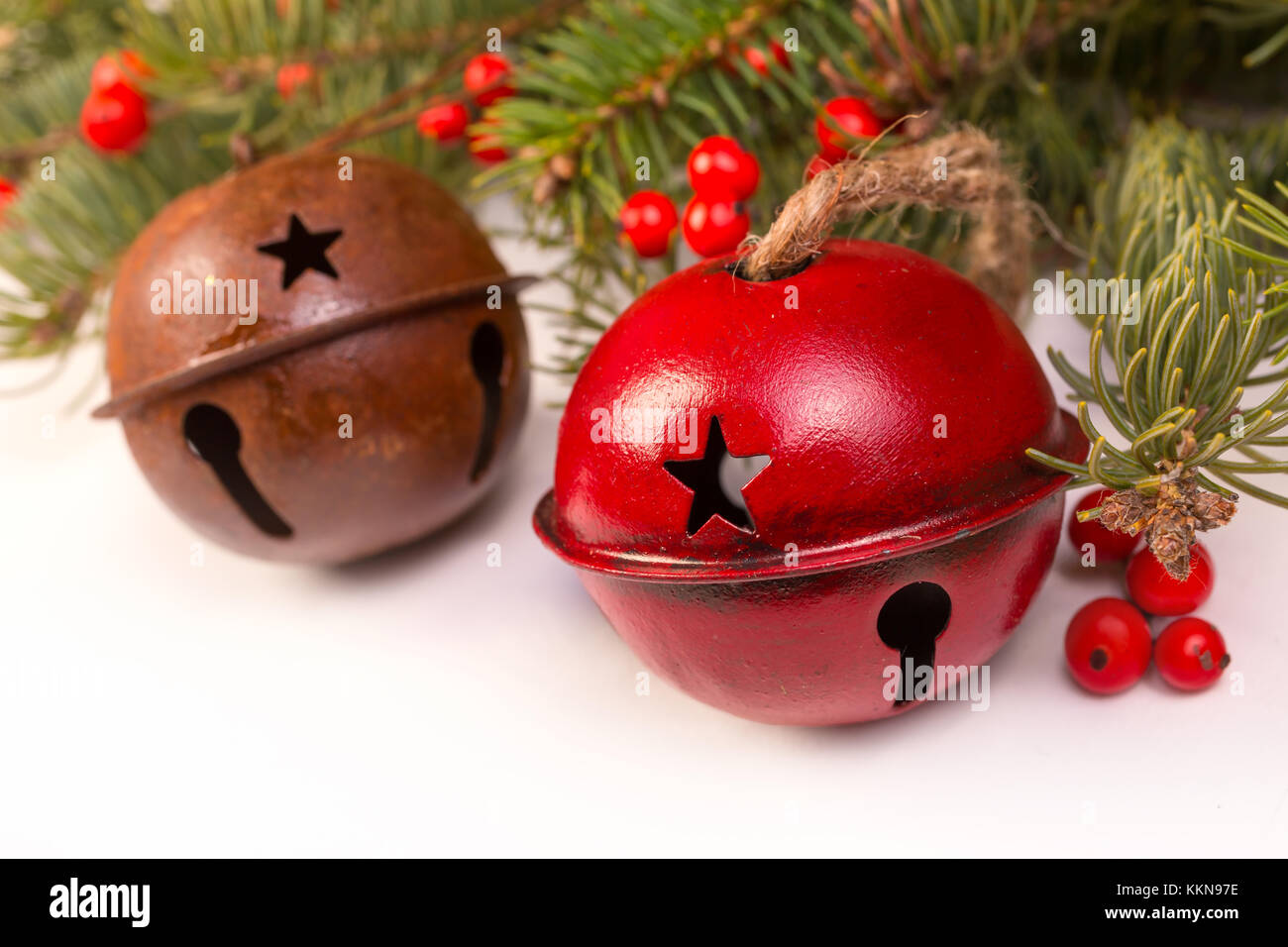 Old fashioned Christmas bells with seasonal foliage Stock Image