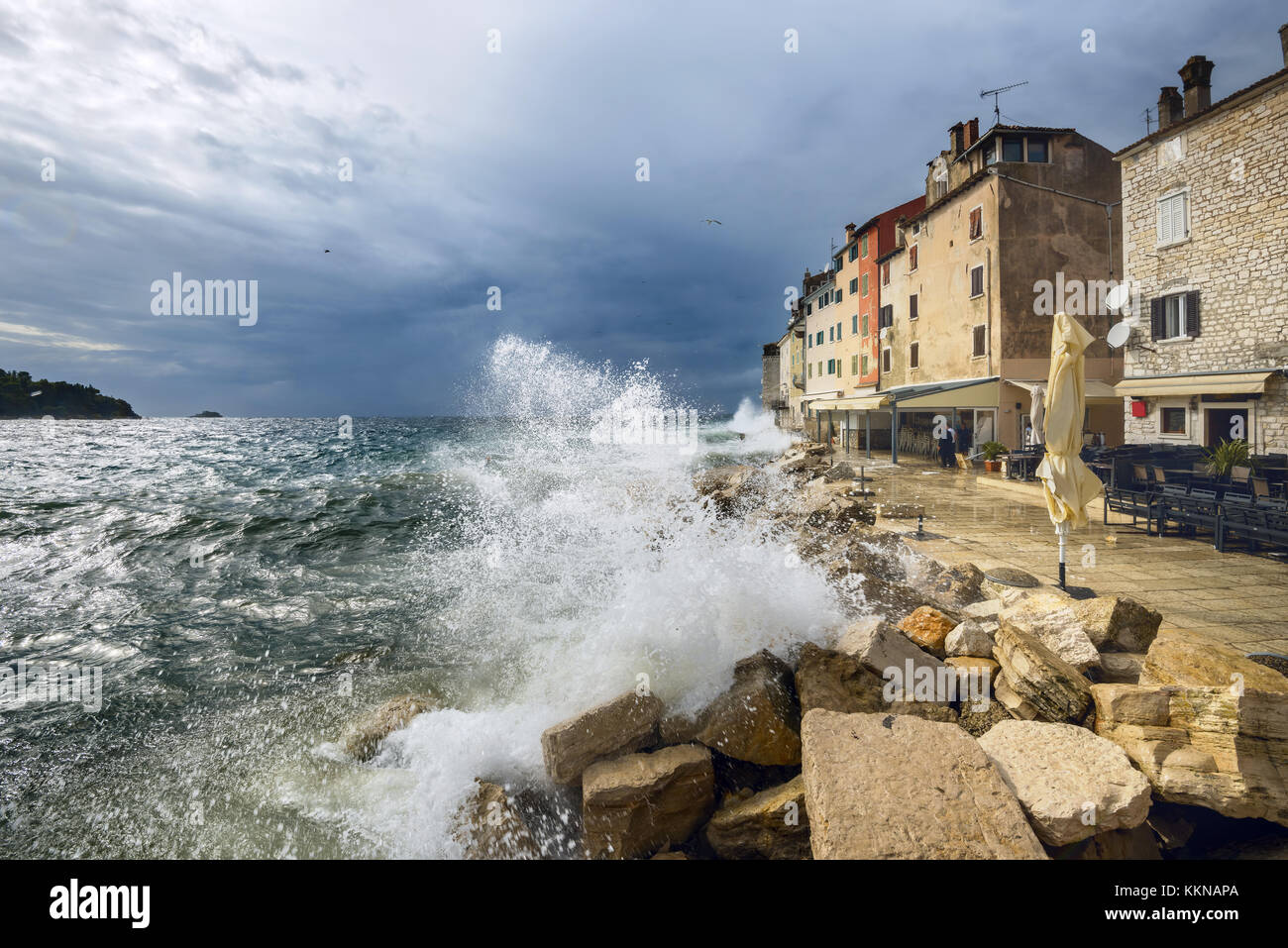 Seafront in old town during storm. Rovinj, Croatia, Istrian Peninsula Stock Photo