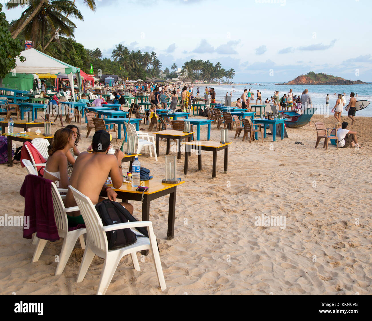 People Sitting At Tables Of Beach Bar Mirissa Sri Lanka Asia