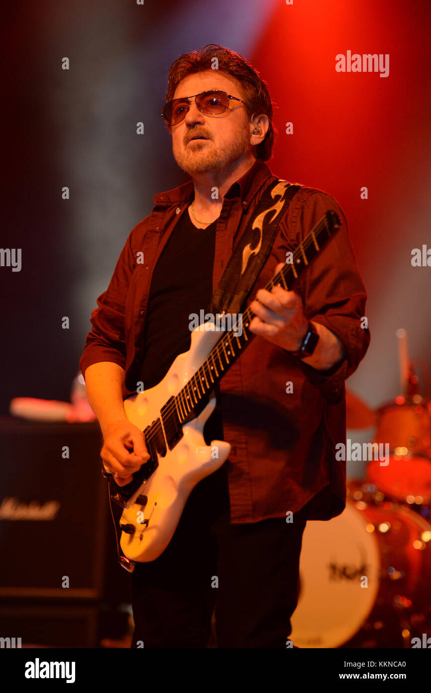 POMPANO BEACH, FL - AUGUST 15: Eric Bloom, Jules Radino and Donald 'Buck Dharma' Roeser of Blue Oyster Cult perform at the Pompano Beach Ampitheatre on August 15, 2015 in Pompano Beach Florida.   People:  Donald Roeser, Buck Dharma Stock Photo