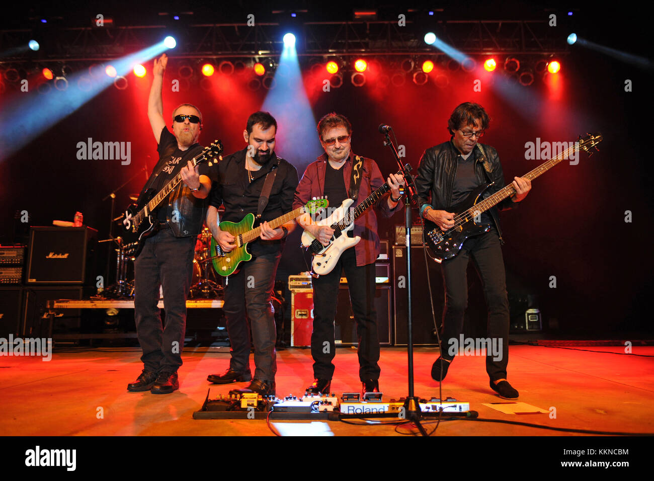 POMPANO BEACH, FL - AUGUST 15: Eric Bloom, Jules Radino and Donald 'Buck Dharma' Roeser of Blue Oyster Cult perform at the Pompano Beach Ampitheatre on August 15, 2015 in Pompano Beach Florida.   People:  Eric Bloom, Richie Castellano, Donald Roeser, Kasim Sulton Stock Photo