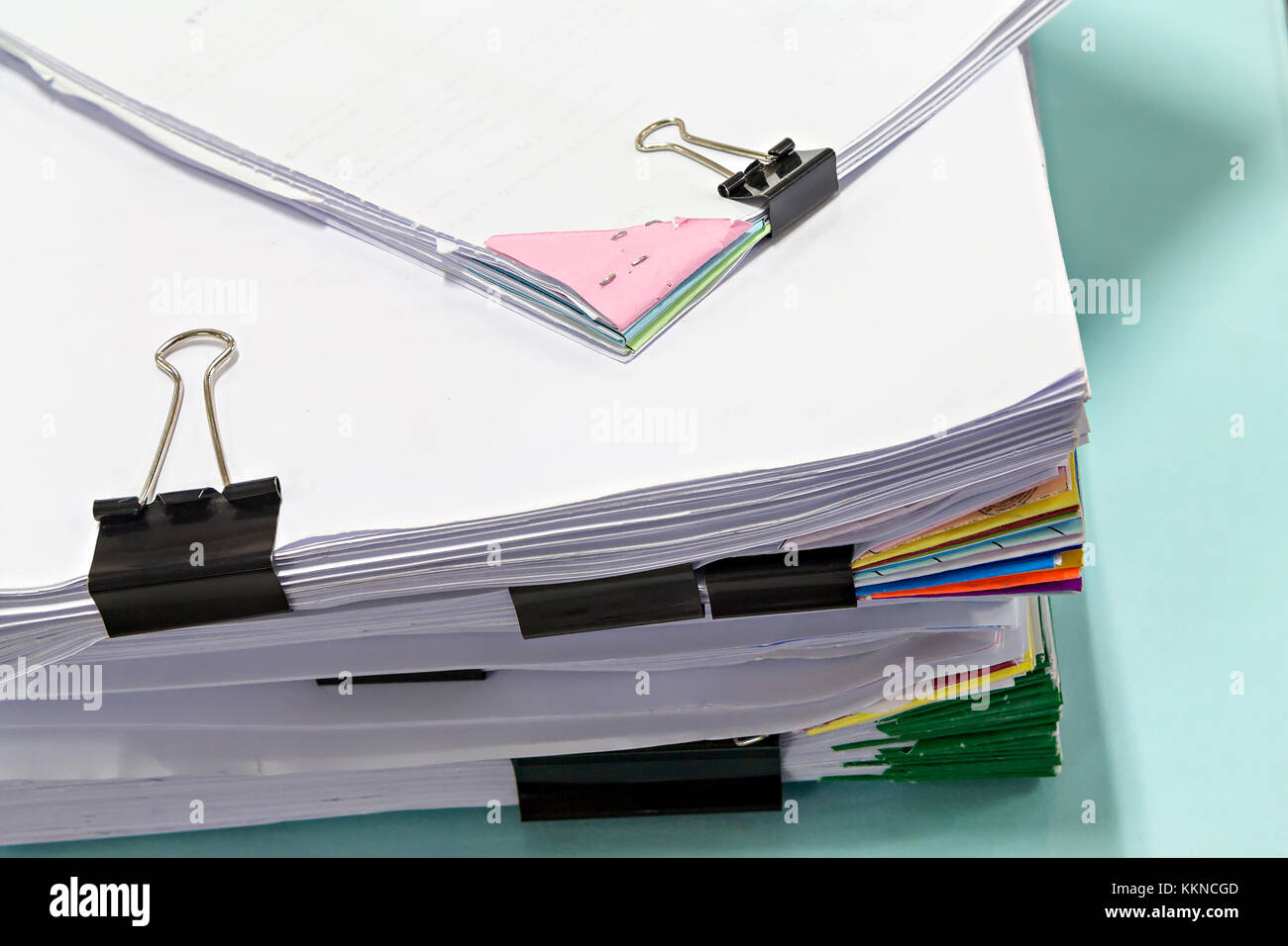 Close up of business documents stack on desk , report papers stack with