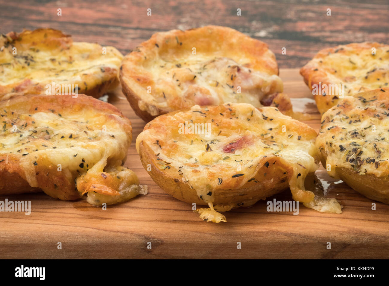 Cheese and bacon filled potato skins Stock Photo Alamy