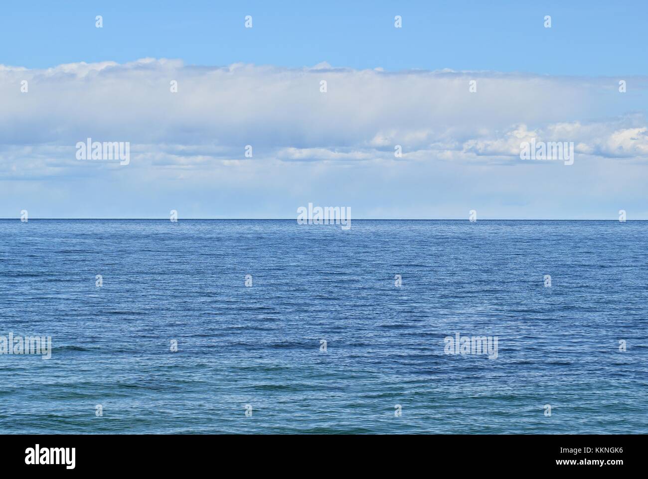 blue sea and sky background with clouds Stock Photo - Alamy