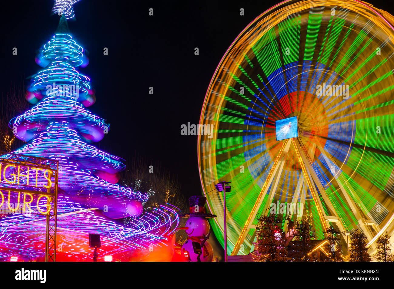 Ferris wheel in motion at night in Luxembourg christmas festival, Luxembourg  City Stock Photo - Alamy