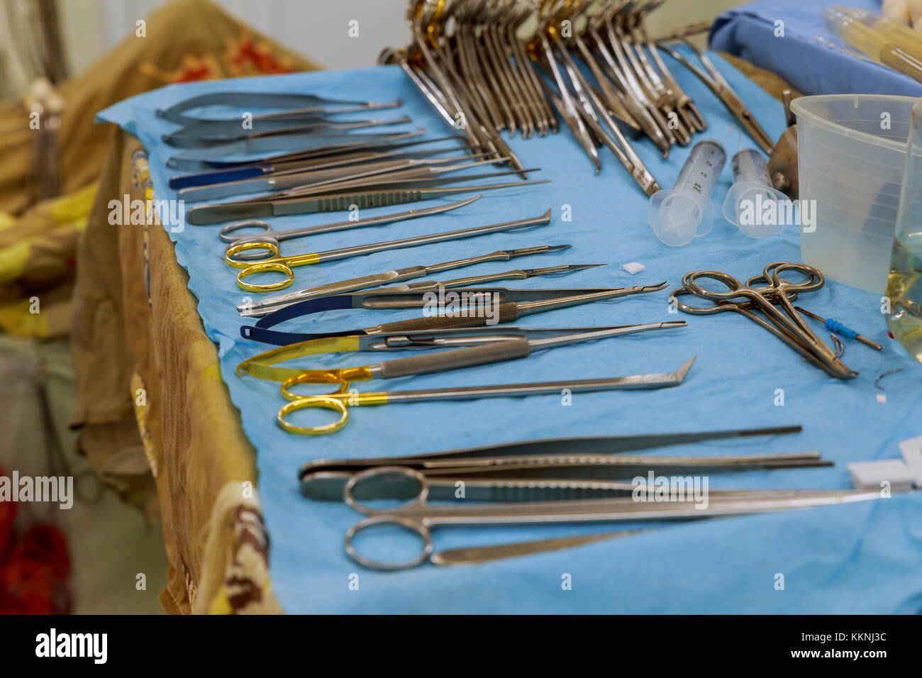 Focus at the scaples,the tools including scalpels, forceps and tweezers arranged on a table for a surgery surgical preparation for surgery tools Stock Photo