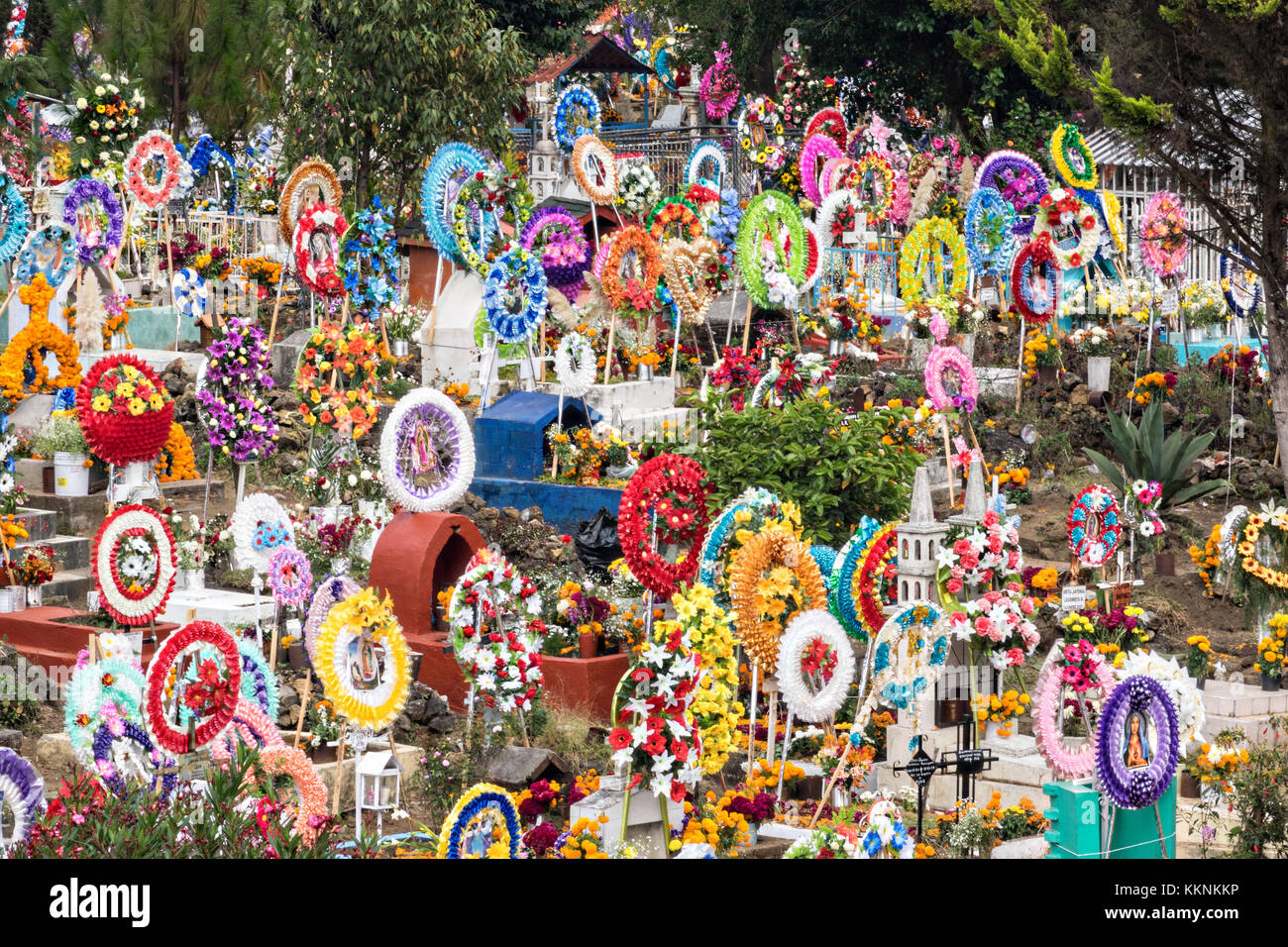 Hundreds of hillside graves decorated with flowers and wreaths for the Day of the Dead festival November 3, 2017 in Nuevo San Juan Parangaricutiro, Michoacan, Mexico. Stock Photo