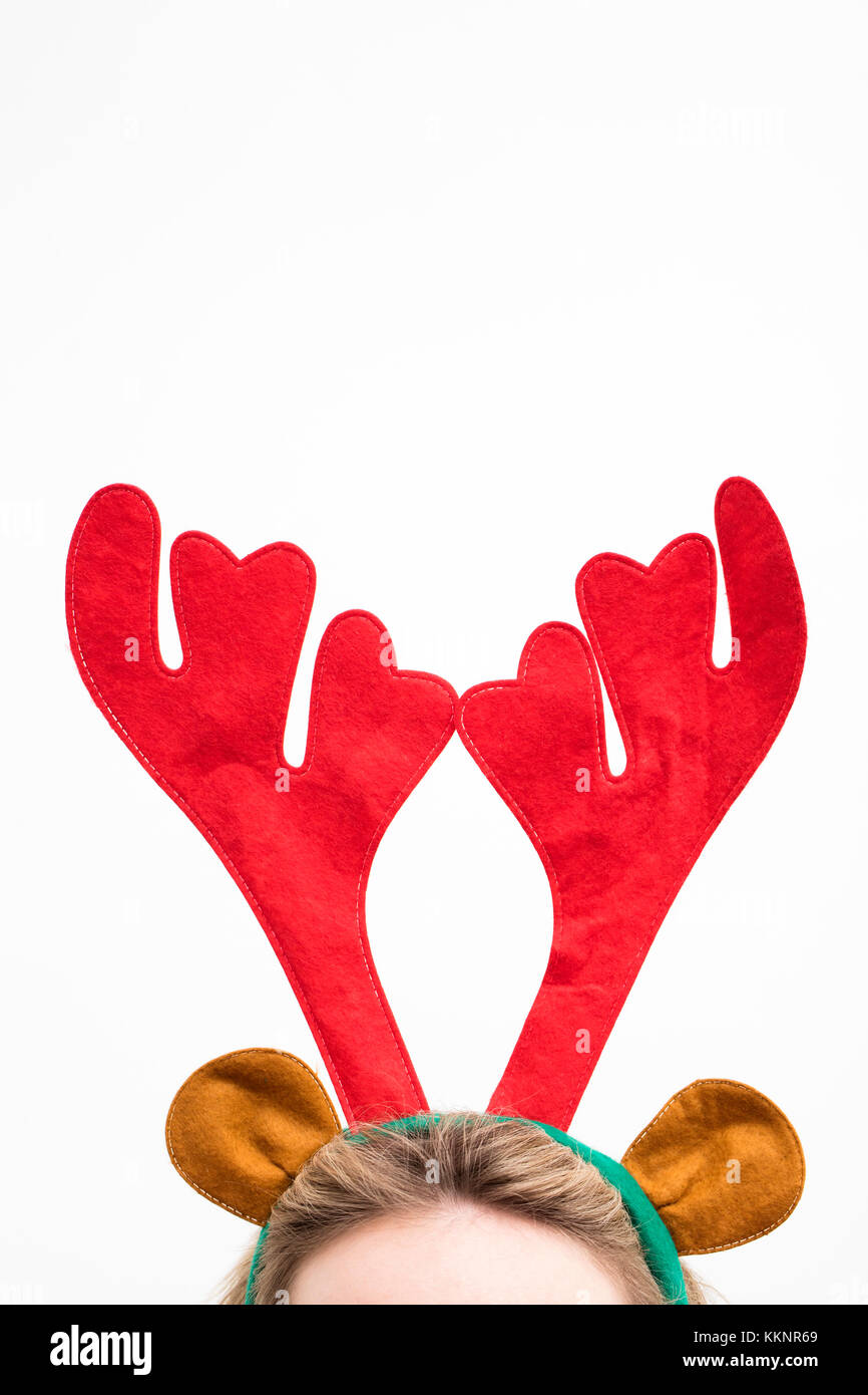 Festive christmas reindeer antler headband on a female head Stock Photo