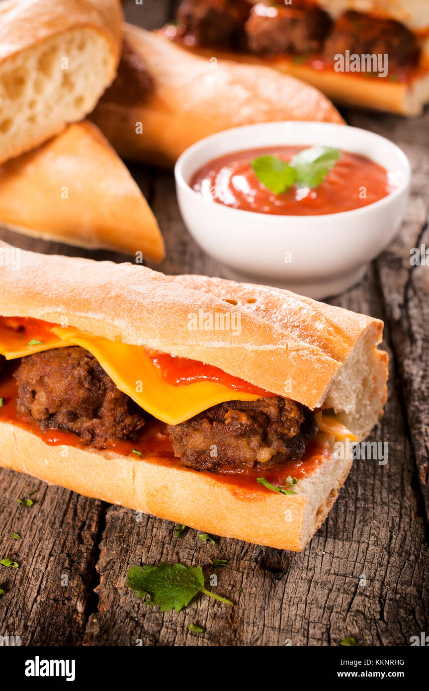 Homemade sandwich with meat balls and melted cheese Stock Photo