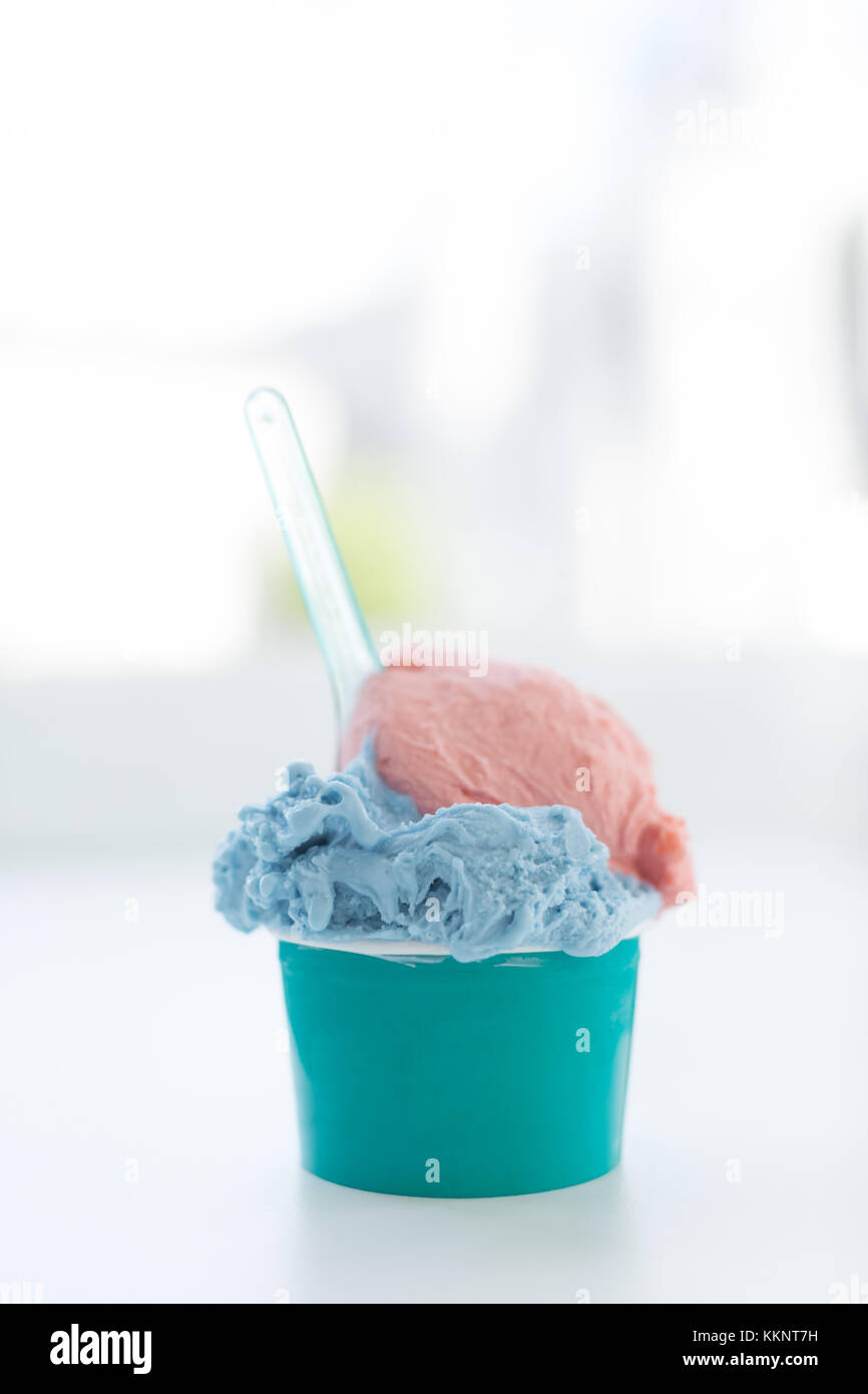 Double scoop ice cream in disposable cup Stock Photo