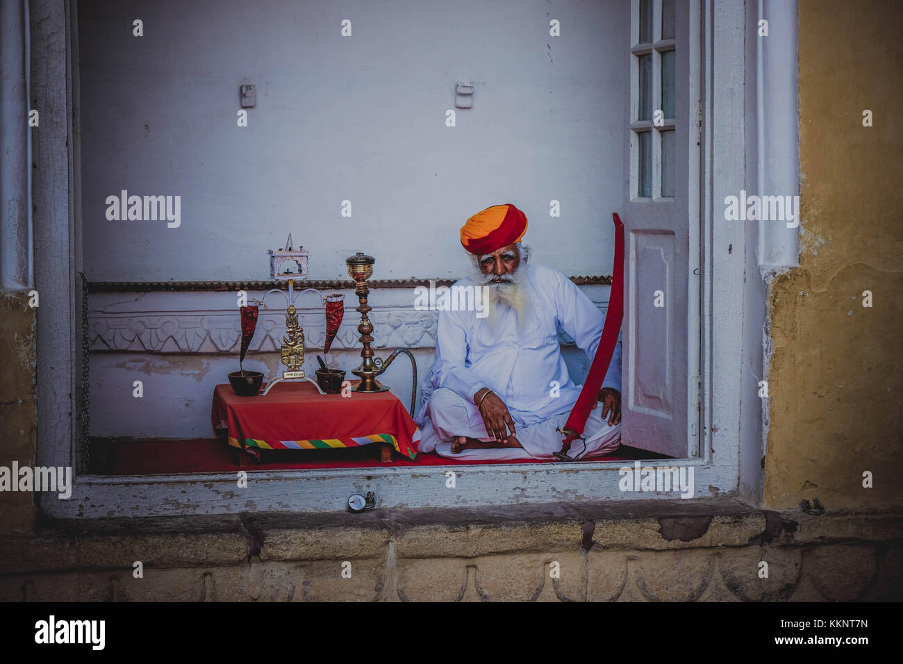Old indian man with traditional objects Stock Photo
